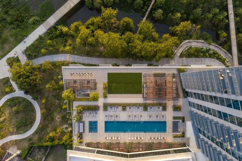 a building with a green lawn